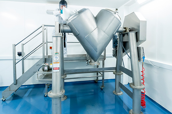 Filling a mixing vessel prior to making another batch of probiotics