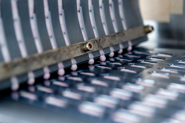 manufacturing of probiotics being inserted into blister packs